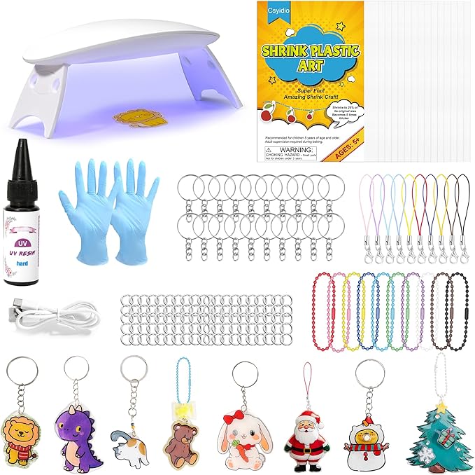 Csyidio 160PCS Shrink Plastic Sheet Kit with 15PCS Shrink Papers, UV Resin, UV Lamp and Keychains Accessories for Kids Craft Ornaments, DIY Key Chains & Christmas Decor